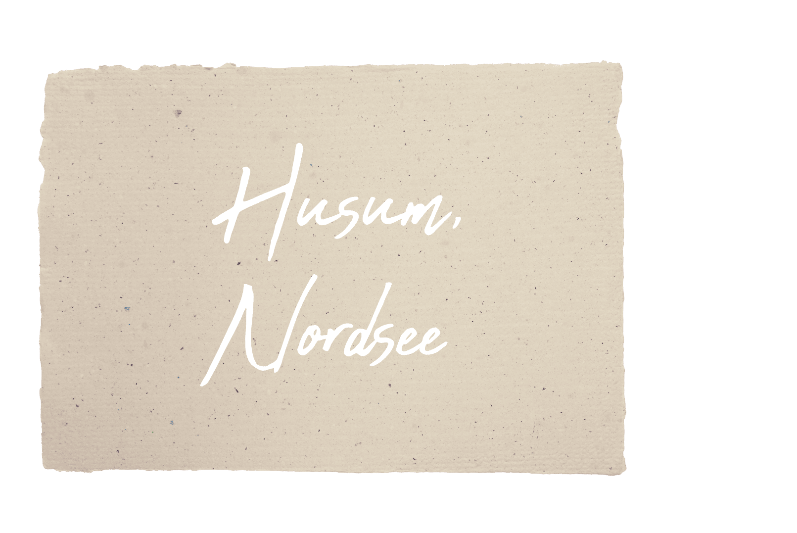 Schreibschrift Text auf Papierausschnitt mit dem Ausspruch „Husum Nordsee“
