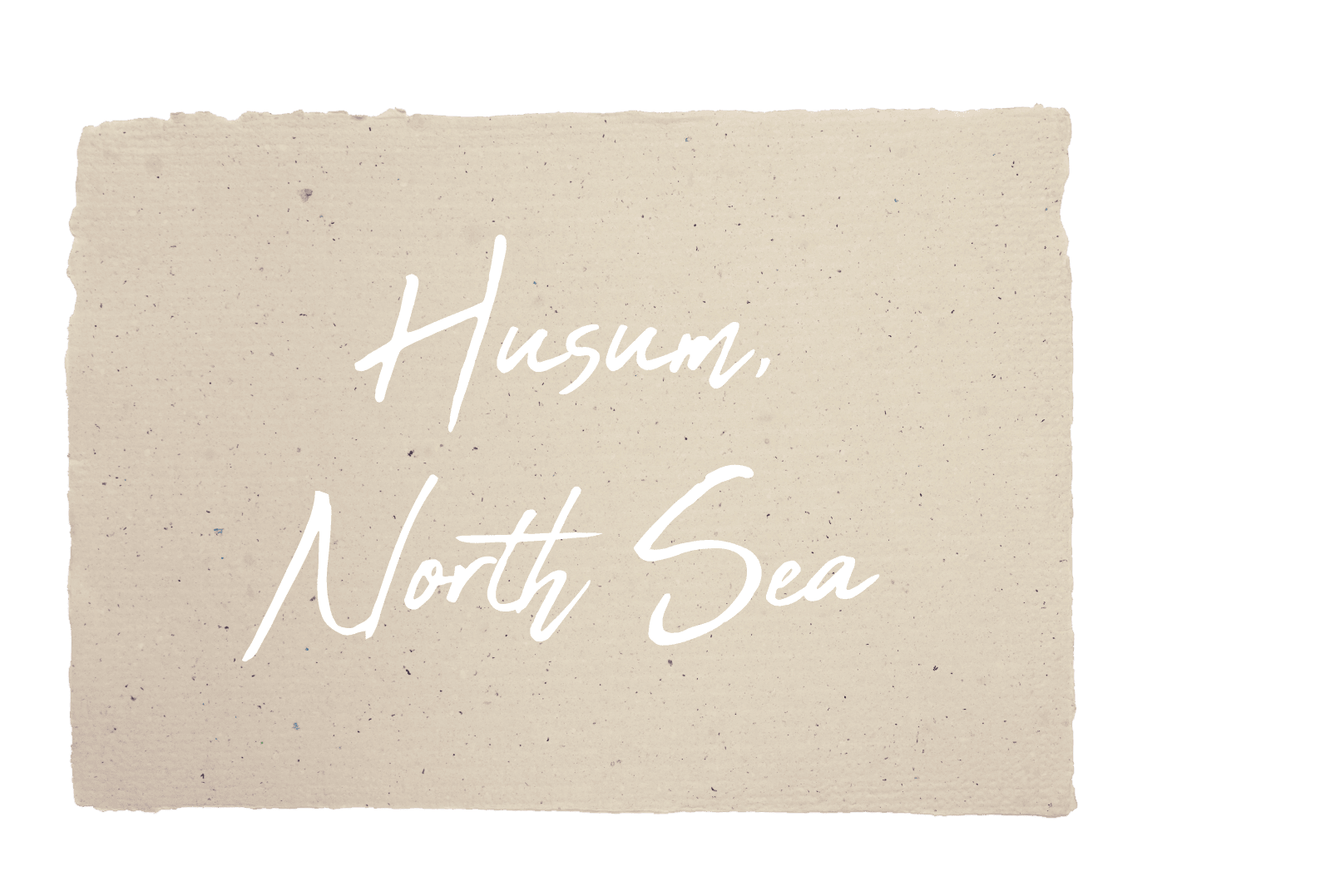 Cursive text on paper with the saying „Husum North Sea“